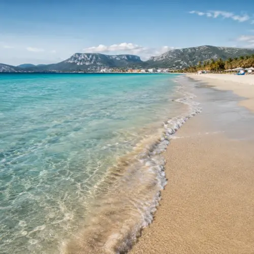 sardinia-turquoise-shoreline-rugged-mountains
